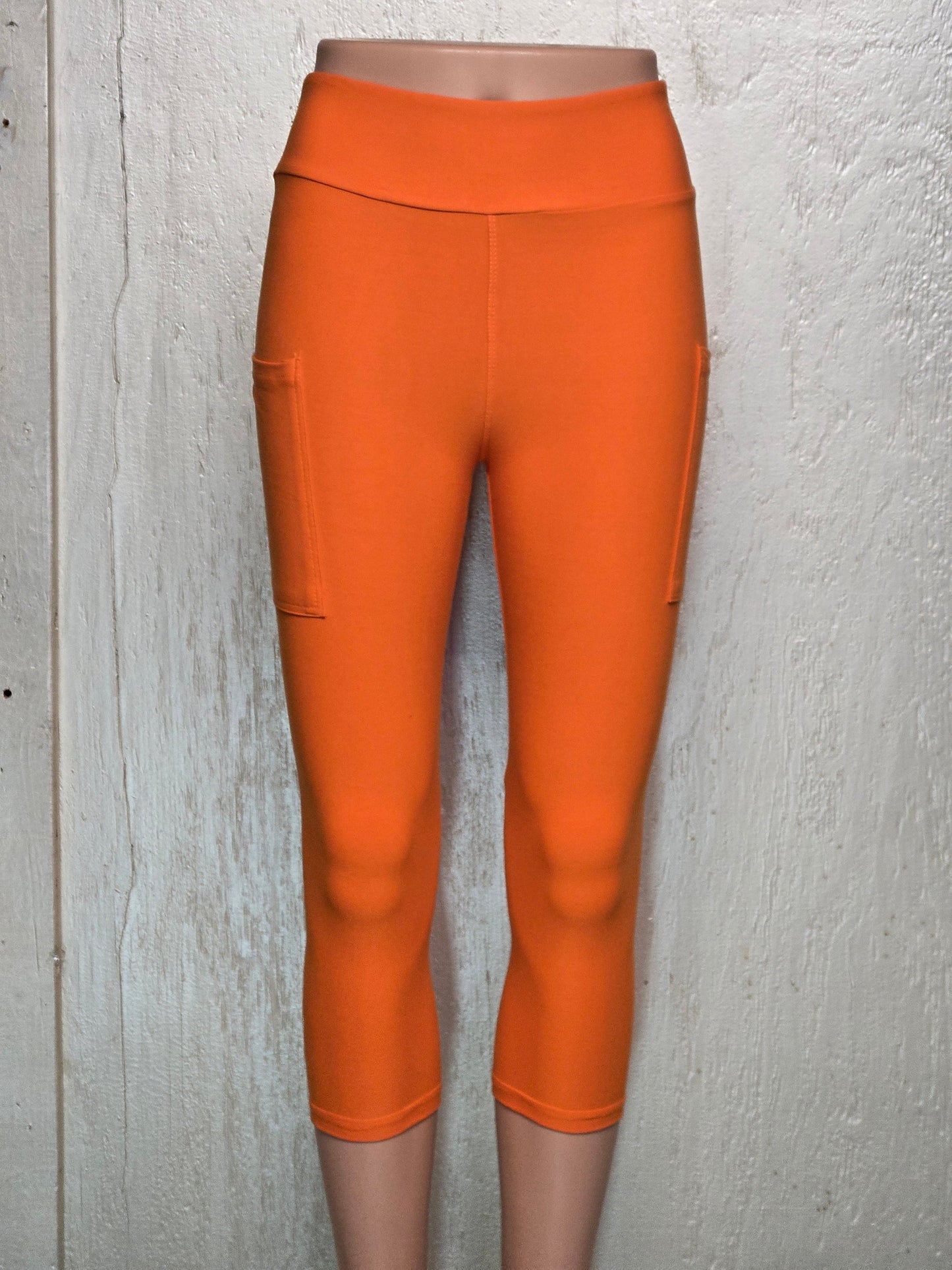 Orange capris and shorts with pockets