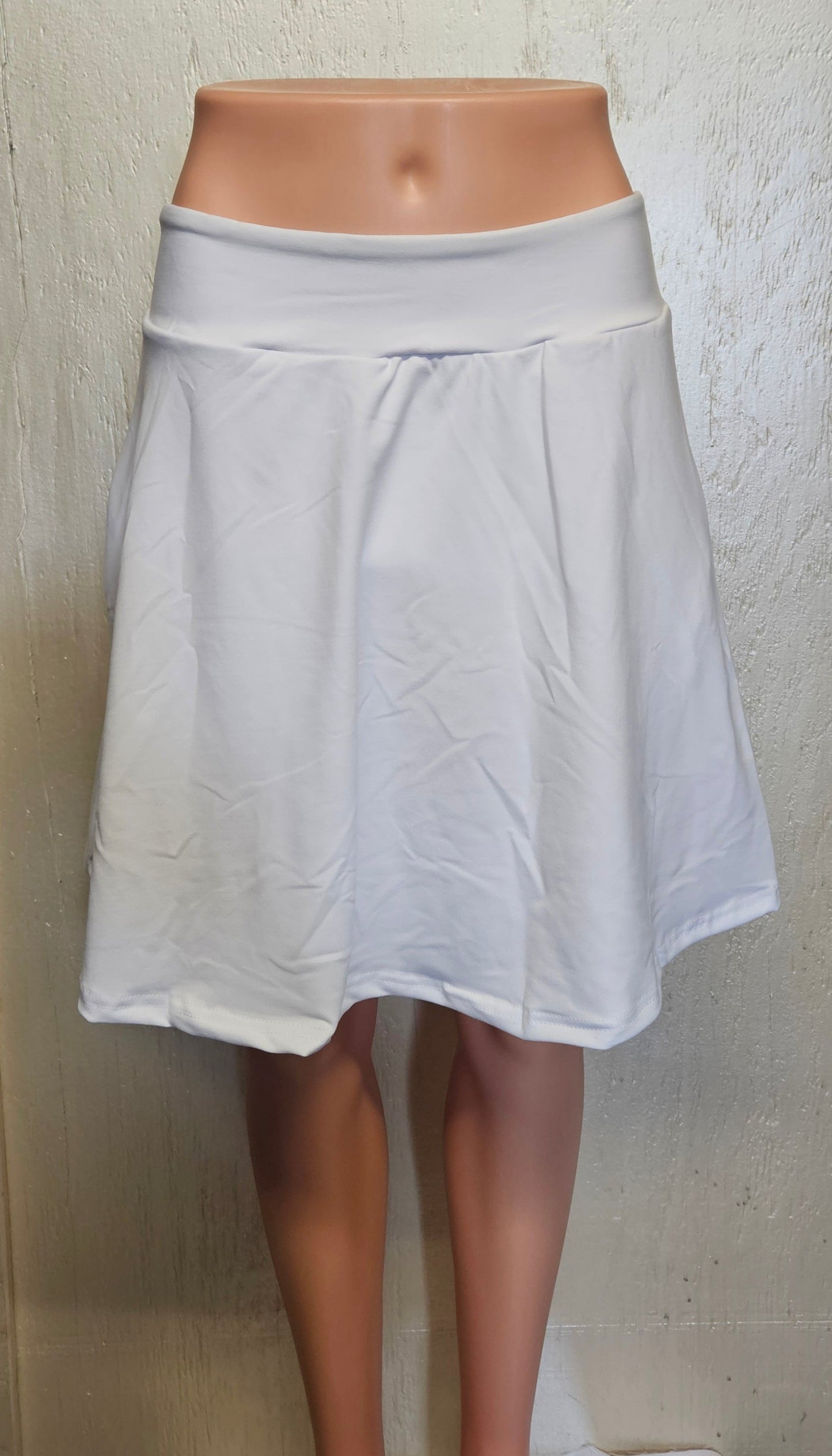 Solid white skorts with pockets