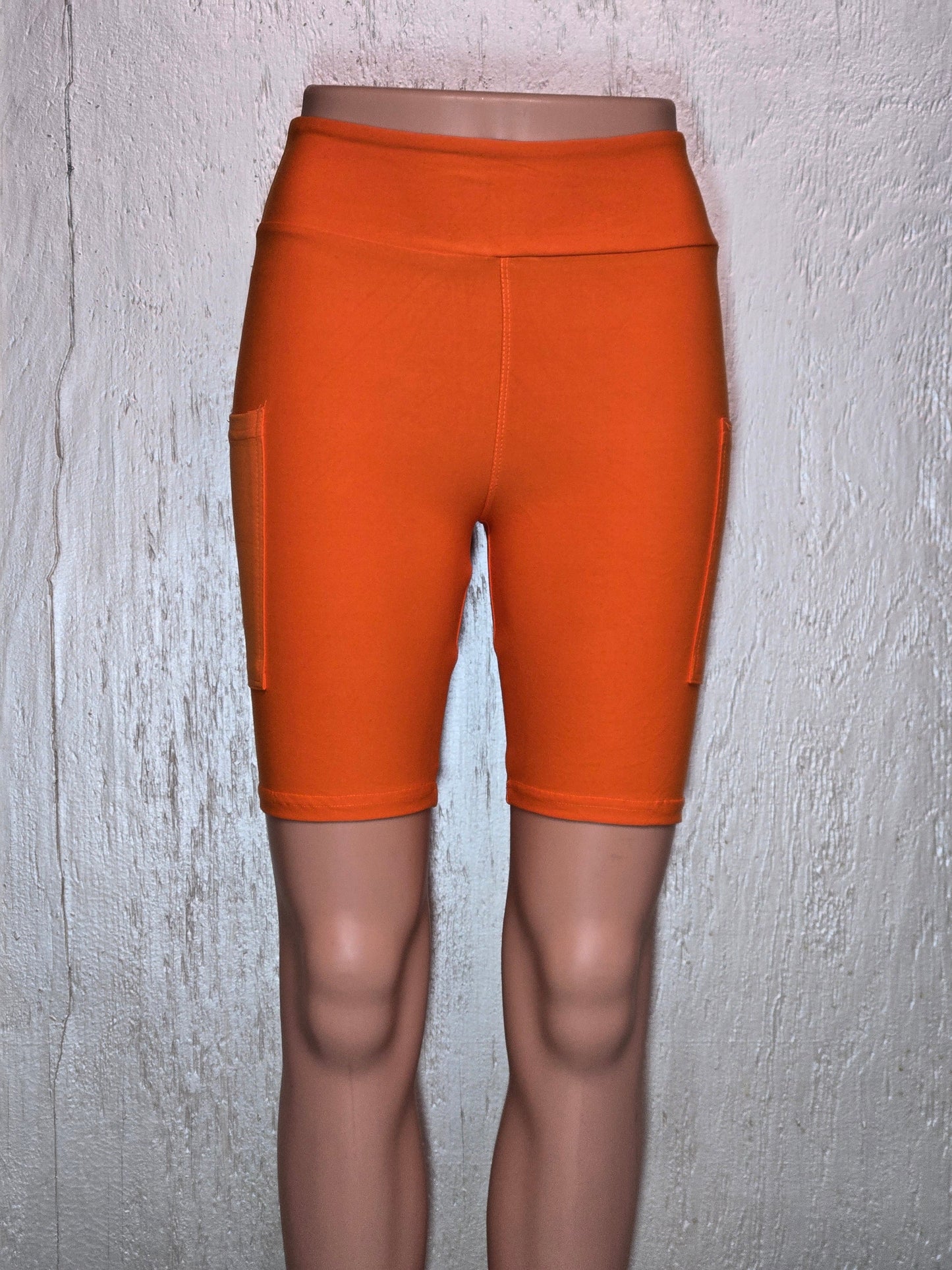 Orange capris and shorts with pockets